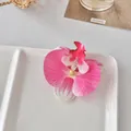 Kunstmatige orchidee bloemkop in magenta en roze voor DIY haaraccessoires en decoraties - Perzikroze