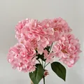 Vibrant pink artificial silk hydrangea bouquet with realistic green leaves and petals - Deep Pink