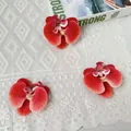 Drie levendige rode kunstmatige phalaenopsis orchideekoppen voor DIY en decoratie - Grapefruit kleur