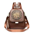 Mochila vintage de cuero marrón oscuro con emblema de elefante y correa con tachuelas - Amarillo