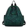 Dark green denim backpack with bamboo floral patterns and punk style black rivets - Green