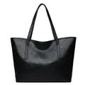 Grande borsa tote in pelle nera intrecciata con cuciture geometriche e tracolle sottili - Patchwork