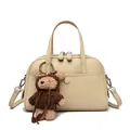 Creamy beige Boston bag in litchi grain leather with cute brown teddy bear pendant - Khaki