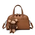 Dark brown lychee pattern leather Boston bag with teddy bear charm and crossbody strap - Yellow Brown