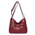 Minimalist soft burgundy washed leather shoulder bag with multiple zippers and long strap - Burgundy