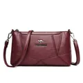 Borsa a conchiglia in pelle di pecora bordeaux con cuciture e tracolla sottile - Borgogna