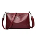 Sac seau vintage en cuir rouge foncé à trois compartiments zippés et bandoulière - Bordeaux