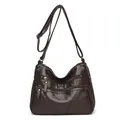 Deep brown washed faux leather crossbody bag with multiple zippers and soft texture - Brown