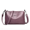 Sac seau élégant en similicuir violet avec trois fermetures éclair et texture grainée - Violet