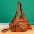 Retro washed leather hobo bag with multi-pocket design and metallic button accents - Dark Brown
