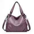 Deep purple leather crossbody tote bag with lychee grain texture and metal hardware - Purple