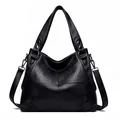Borsa tote classica in pelle nera con trama litchi e dettagli metallici argentati - Nero