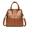 Quilted sheepskin-style leather backpack in deep brown with adjustable straps - Yellow Brown