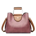 Dunkelviolette Kuriertasche aus Leder mit Metallgriff und Känguru-Logo-Verzierung - Lila