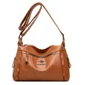 Brown lychee texture crossbody bag featuring kangaroo metal logo and adjustable strap - Brown