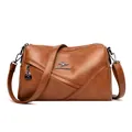Brown washed sheepskin leather barrel bag with kangaroo logo and cross stitching - Yellow