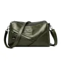 Dark green bucket crossbody bag in washed sheepskin style with a layered zipper design - Green
