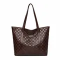 Deep brown tote bag with quilted diamond pattern and metallic logo plate decoration - Brown