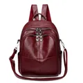 Mochila versátil de cuero sintético burdeos oscuro con acabado vintage y multibolsillos - Rojo
