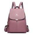 Zaino da donna in pelle martellata rosa antico con logo a canguro dorato elegante - Viola