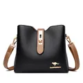 Contrast kangaroo bucket bag in black lychee leather with brown straps and gold lock - Black