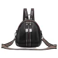 Mini black shell backpack in glossy faux leather with striped web straps - Black