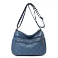 Blauwe gewatteerde crossbodytas van kunstleer met ritssluitingen en verstelbare schouderband - Blauw