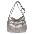 Metallic silver washed leather crossbody bag with three zipper pockets and adjustable strap - Silver
