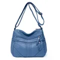 Blue soft washed leather crossbody bag featuring triple zipper pockets and side pockets - Lake Blue