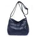 Navy blue washed leather crossbody bag with multiple zippers and adjustable strap - Blue
