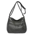 Dark green washed leather crossbody bag with multiple zip pockets and wide strap - Green