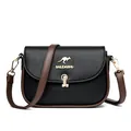 Sac bandoulière femme en cuir noir avec sangle marron et logo kangourou doré - Noir