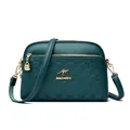 Dark green leather crossbody bag with dual zippers and litchi texture embossing - Lake Blue