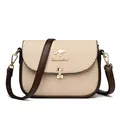 Women's genuine leather crossbody bag in cream and brown with gold kangaroo logo - Apricot