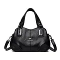 Elegant black genuine leather handbag with silver kangaroo logo and adjustable strap - Black