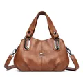 Brown leather handbag with pebble texture and silver kangaroo logo for middle-aged women - Brown