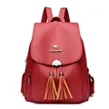 Sac à dos rouge en cuir souple avec texture litchi et pampilles décoratives chic - Rouge