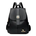 Women's black faux leather backpack featuring pebble texture and golden kangaroo logo - Black
