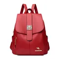 Red pebbled leather backpack with silver square buckle and kangaroo logo branding - Red