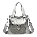 Metallisch silberne Lederhandtasche mit Schlangenhauttextur und grauen Webgriffen - Silber