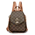 Classic monogram backpack in dark brown PVC with gold-tone lock and kangaroo logo - Brown