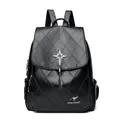 Quilted black backpack featuring silver rhinestone star and metal tassels accent - Black