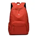 Waterproof red outdoor sports backpack with large capacity and silver logo detailing - Red