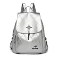 Silver quilted backpack for women featuring rhinestone star and fringe details - Silver