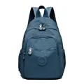 Sac à dos en nylon bleu marine pour femme avec plusieurs poches et logo circulaire - Bleu clair