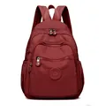 Sac à dos pour femme en nylon délavé rouge bordeaux avec plusieurs compartiments zippés - Rouge