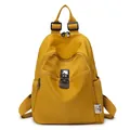 Bright yellow nylon backpack with anti-theft lock and adjustable straps for school and travel - Yellow