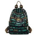 Vintage floral backpack in black with teal lettering and secure metal lock design - Green Letter