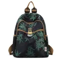 Vintage floral backpack featuring green bamboo leaf prints on black nylon fabric - Green Large Bamboo Section