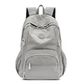 Sac à dos gris clair minimaliste en tissu lavé avec design fonctionnel multi-poches - Gris clair